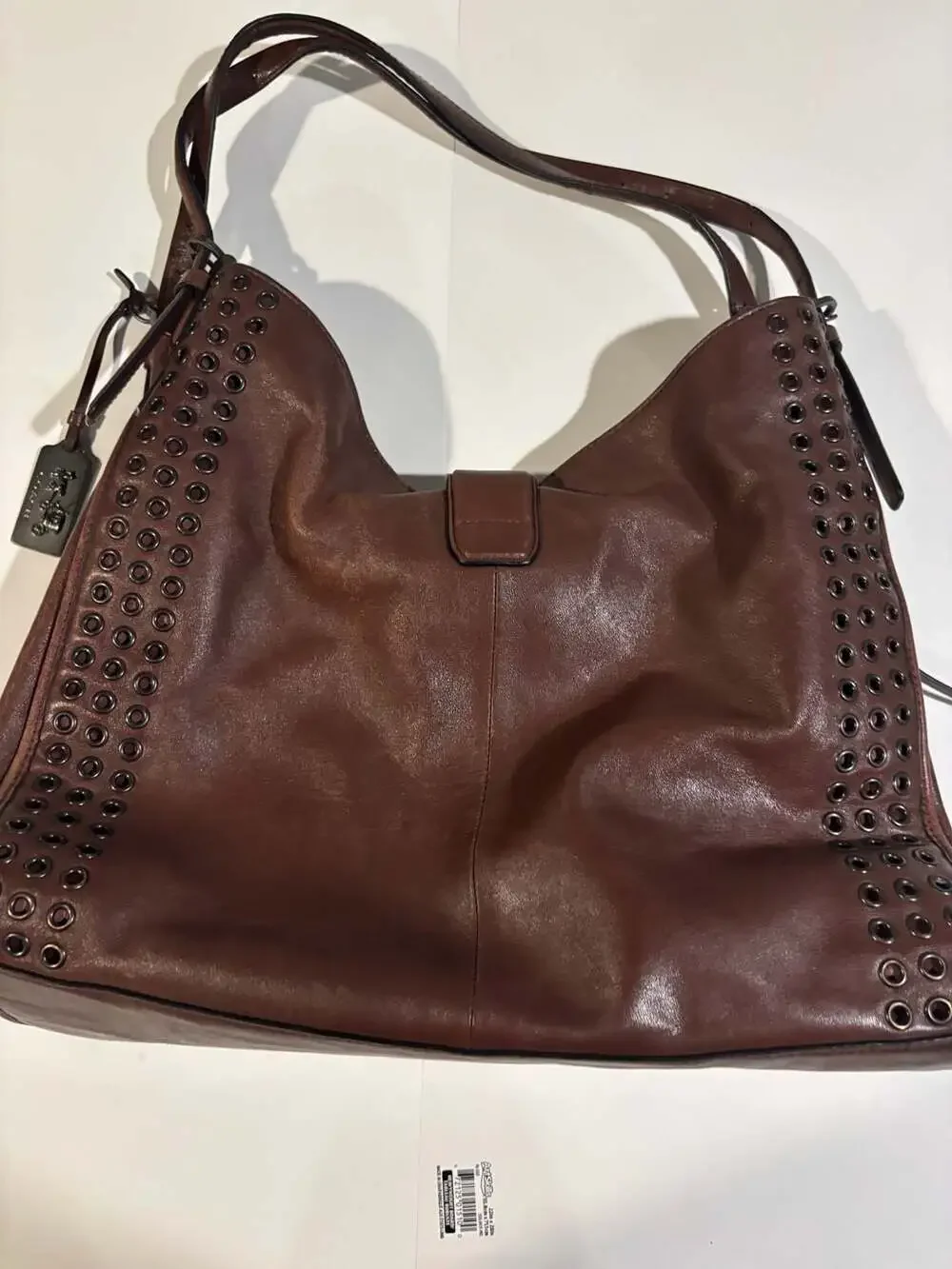 Coach Brown Leather Hobo Shoulder Bag with Grommets and Turnlock Closure